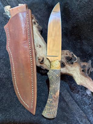 handmade knife with wood handle and brass pins